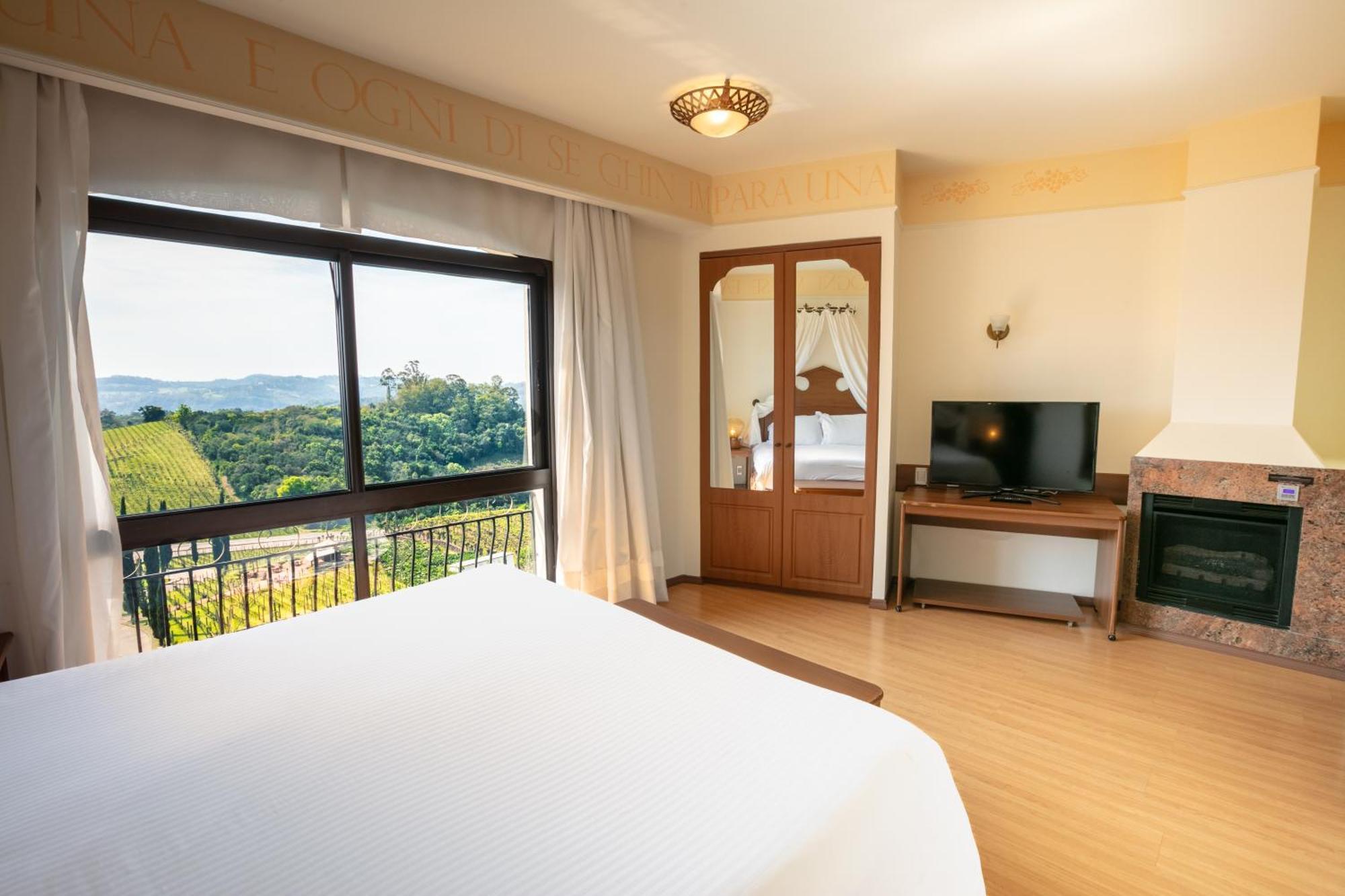 Spa Do Vinho Condominio Vitivinicola Bento Gonçalves Exteriör bild A bedroom at the hotel