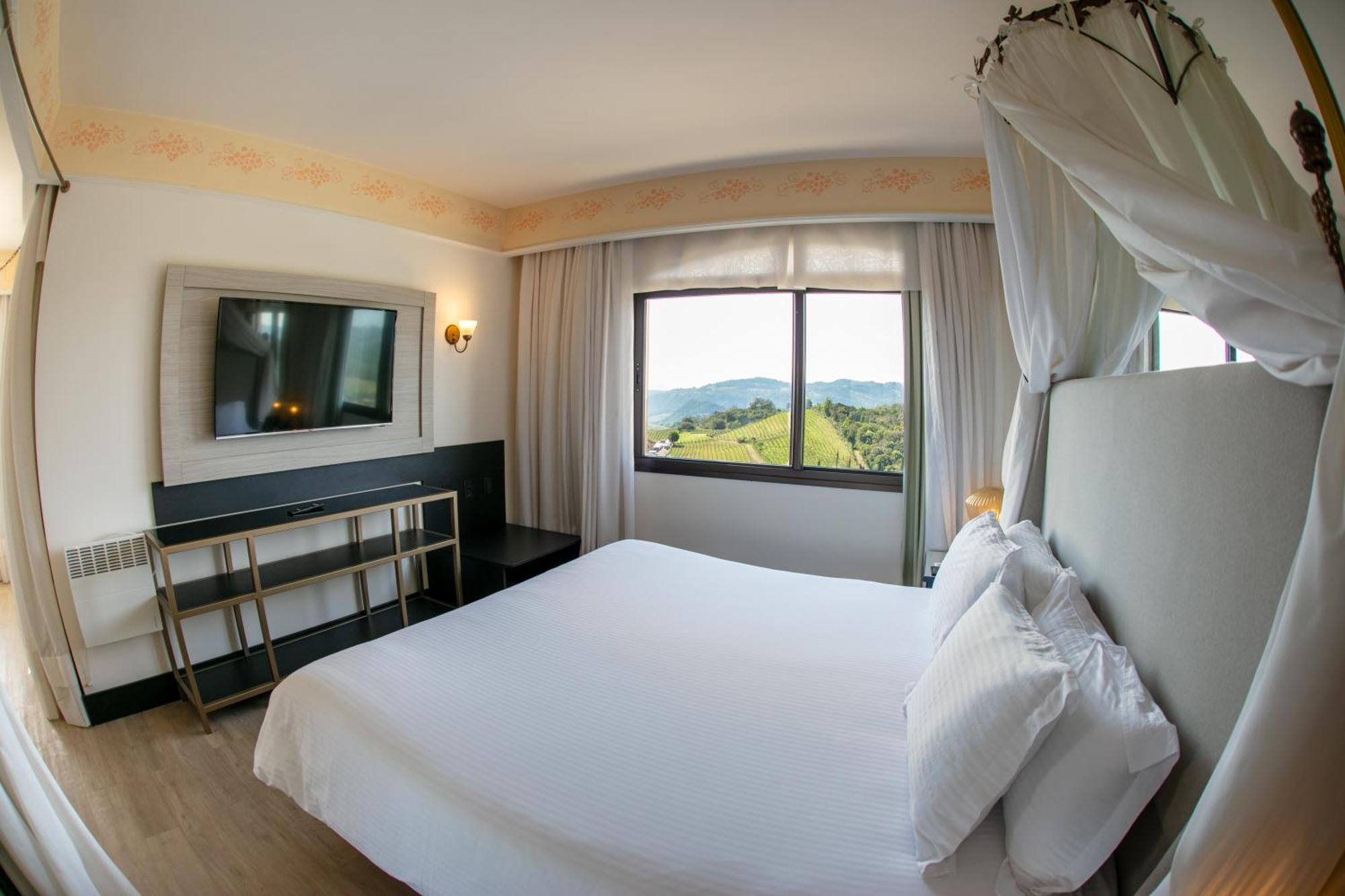 Spa Do Vinho Condominio Vitivinicola Bento Gonçalves Exteriör bild A bedroom at the hotel